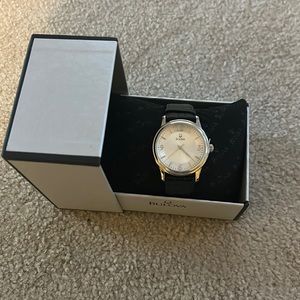 Bulova black watch.